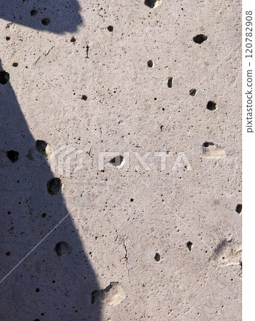 Close up of Stone Concrete with Bubble Holes Industrial Background 120782908