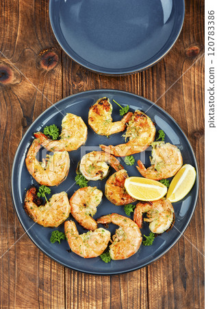 Herb-marinated giant prawns. Herb-marinated giant prawns. 120783386