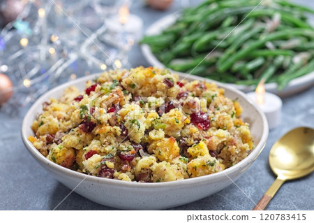 Traditional Cranberry pecan cornbread dressing for poultry or meat stuffing, in bowl, horizontal Traditional Cranberry pecan cornbread dressing for poultry or meat stuffing, in bowl, horizontal 120783415