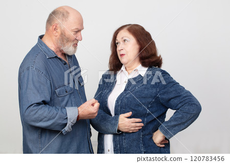Portrait of an elderly couple in love. They argue and discuss Portrait of an elderly couple in love. They argue and discuss 120783456