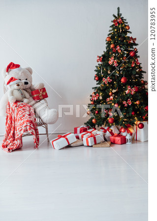 Christmas tree with gifts decorated with garlands toys for the new year Christmas tree with gifts decorated with garlands toys for the new year 120783955