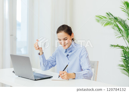 Business woman working on laptop online in office 120784132