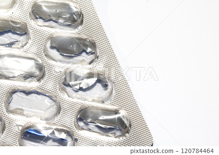 Open Used Broken Foil Pill Popping Tablet Dispenser Blister Packet Close Up 120784464