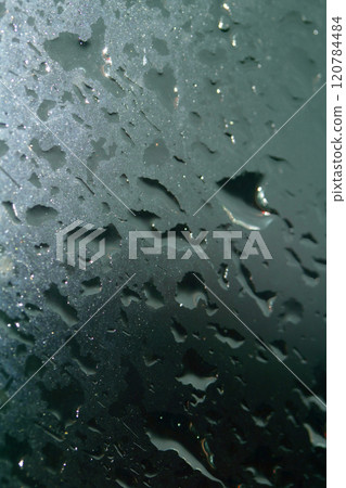 Close Up of Rain Drop Bubble Water on Glass Metal Background with Condensation 120784484