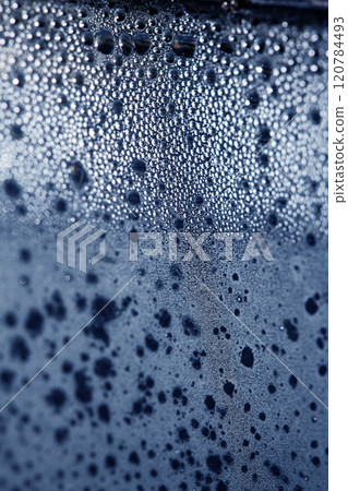 CLose Up of Condensation Bubbles and Marks on A Window Water Background CLose Up of Condensation Bubbles and Marks on A Window Water Background 120784493