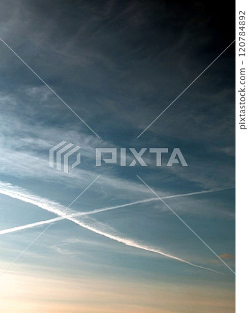 Blue Skys With Aeroplane condensation trails Contails in White Smoke for Background Blue Skys With Aeroplane condensation trails Contails in White Smoke for Background 120784892