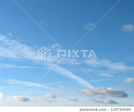 Cloudscape Fluffy White Clouds and Blue Sky for Background Cloudscape Fluffy White Clouds and Blue Sky for Background 120784894