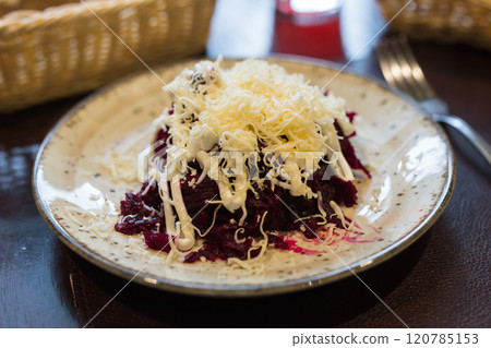 Grated boiled beets with garlic, cheese and mayonnaise 120785153
