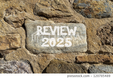 Planning review 2025 new year symbol. Concept words Review 2025 on beautiful grey stone. Beautiful big stone wall background. Business review 2025 new year concept. Copy space. Planning review 2025 new year symbol. Concept words Review 2025 on beautiful grey stone. Beautiful big stone wall background. Business review 2025 new year concept. Copy space. 120785489
