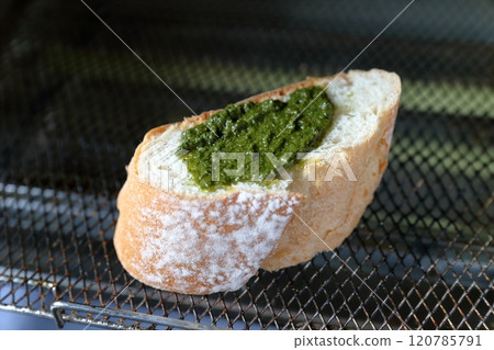 Basil bread: French bread with basil paste 120785791