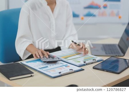 Business Documents, Auditor businesswoman checking searching document legal prepare paperwork or report for analysis TAX time,accountant Documents data contract partner deal in workplace office 120786827