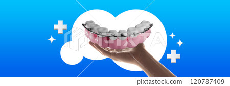 Contemporary art collage. Dental model with braces held in hand, surrounded by medical symbols, highlighting orthodontics and teeth alignment care. 120787409
