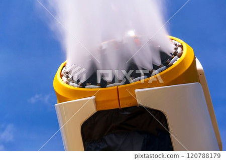 Snow making machines on slope on sunny day, snow cannon, snow gun Snow making machines on slope on sunny day, snow cannon, snow gun 120788179