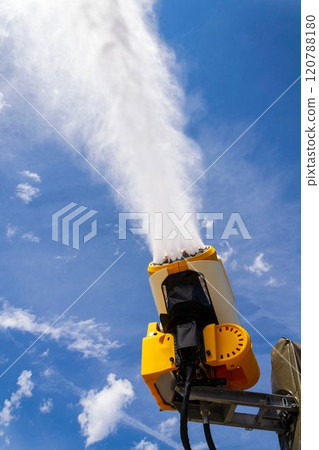 Snow making machines on slope on sunny day, snow cannon, snow gun Snow making machines on slope on sunny day, snow cannon, snow gun 120788180