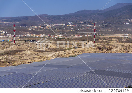 Solar panels at photovoltaic power station farm, future innovation energy concept 120789119