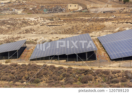 Solar panels at photovoltaic power station farm, future innovation energy concept Solar panels at photovoltaic power station farm, future innovation energy concept 120789120