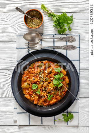 healthy zucchini stew in tomato sauce, top view 120789538