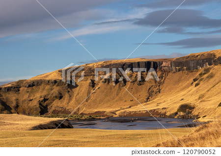 Field and Systrastapi rock in the autumn, Iceland 120790052