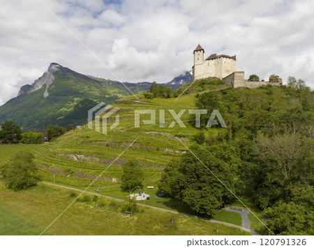 Gutenberg Castle - Medieval Burg in town of Balzers, Principality of Liechtenstein. Aerial Picturesque summer landscape 120791326