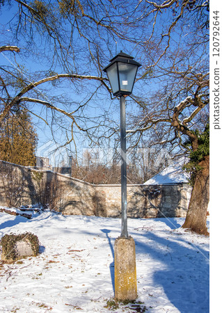 Old lantern in winter in snowy weather in Salzburg in Austria. 120792644