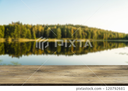 Wooden table with forest lake and nature background. Product display background. 120792681