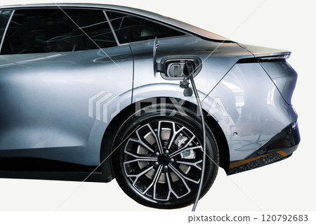 Charging an electric car. Modern electric car Charging an electric car. Modern electric car 120792683