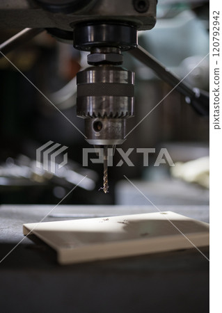 Threading with a Tapping Drilling Machine 120792942