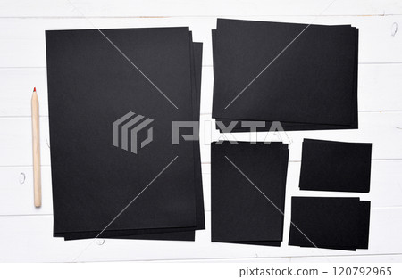 stack of black paper 120792965
