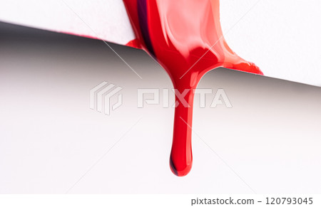 Red spilled nail polish 120793045