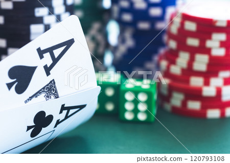 Poker ace pair on chips background Poker ace pair on chips background 120793108