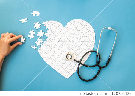 White puzzle in heart shape 120793122