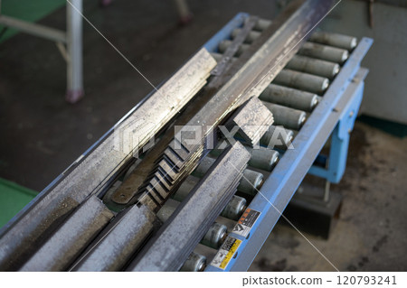 Cutting material with a metal saw Cutting material with a metal saw 120793241