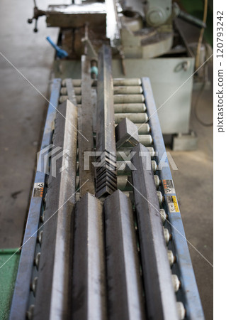 Cutting material with a metal saw Cutting material with a metal saw 120793242