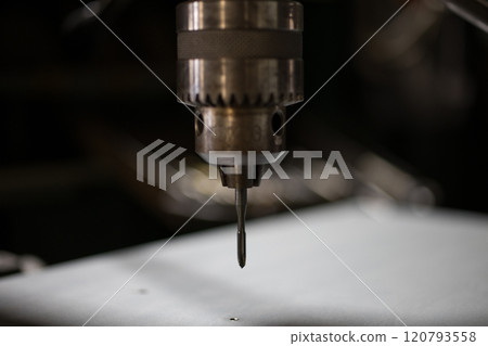 Threading with a Tapping Drilling Machine 120793558
