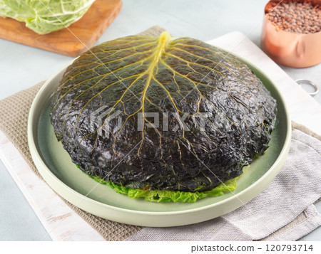 Chou farci, stuffed savoy cabbage pie with lentil quinoa ragu Chou farci, stuffed savoy cabbage pie with lentil quinoa ragu 120793714