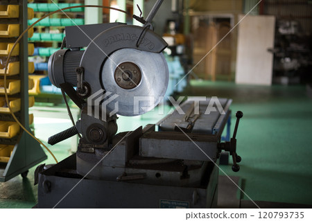 Cutting material with a metal saw Cutting material with a metal saw 120793735