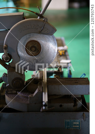 Cutting aluminum frame with metal saw Cutting aluminum frame with metal saw 120793743