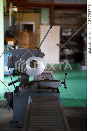 Cutting aluminum frame with metal saw Cutting aluminum frame with metal saw 120793748