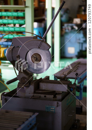 Cutting aluminum frame with metal saw Cutting aluminum frame with metal saw 120793749