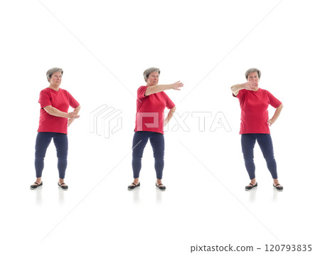 Tai chi forms performed by older woman 120793835
