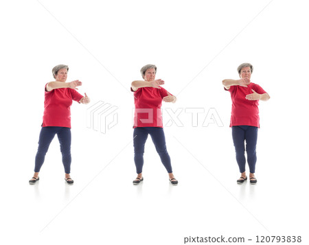 Tai chi forms performed by older woman 120793838