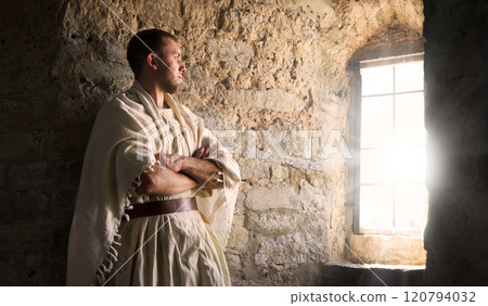 Ancient man at the window Ancient man at the window 120794032