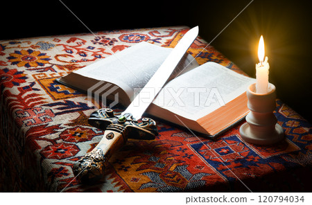 Old sword on the bible Old sword on the bible 120794034