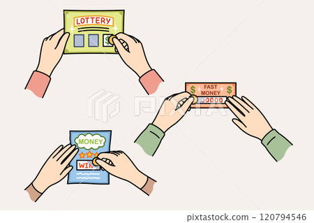 Lottery tickets in hands of gambling people who erase protective layer to find out winning amount 120794546