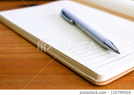 Notebook and pen, writing utensils, educational image 120794926