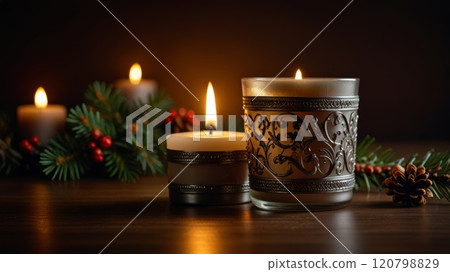 Elegant candles surrounded by fragrant pine branches and berries, casting a warm glow against a dark backdrop, creating a serene and festive holiday atmosphere. 120798829