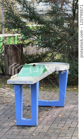 Colorful Mini Golf Course in a Tranquil Outdoor Setting Colorful Mini Golf Course in a Tranquil Outdoor Setting 120799871