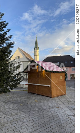 Festive Christmas Market Stall in Quaint Village Square in Bavaria, Germany 120799877