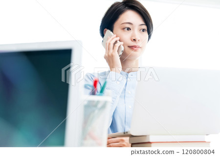 Business woman calling with a smartphone Business woman calling with a smartphone 120800804