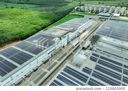 Solar energy for factory and warehouse building. Solar panels on roof of industrial plant. Commercial solar power. Rooftop solar power. Rooftop renewable energy system. Sustainable green energy. 120803008